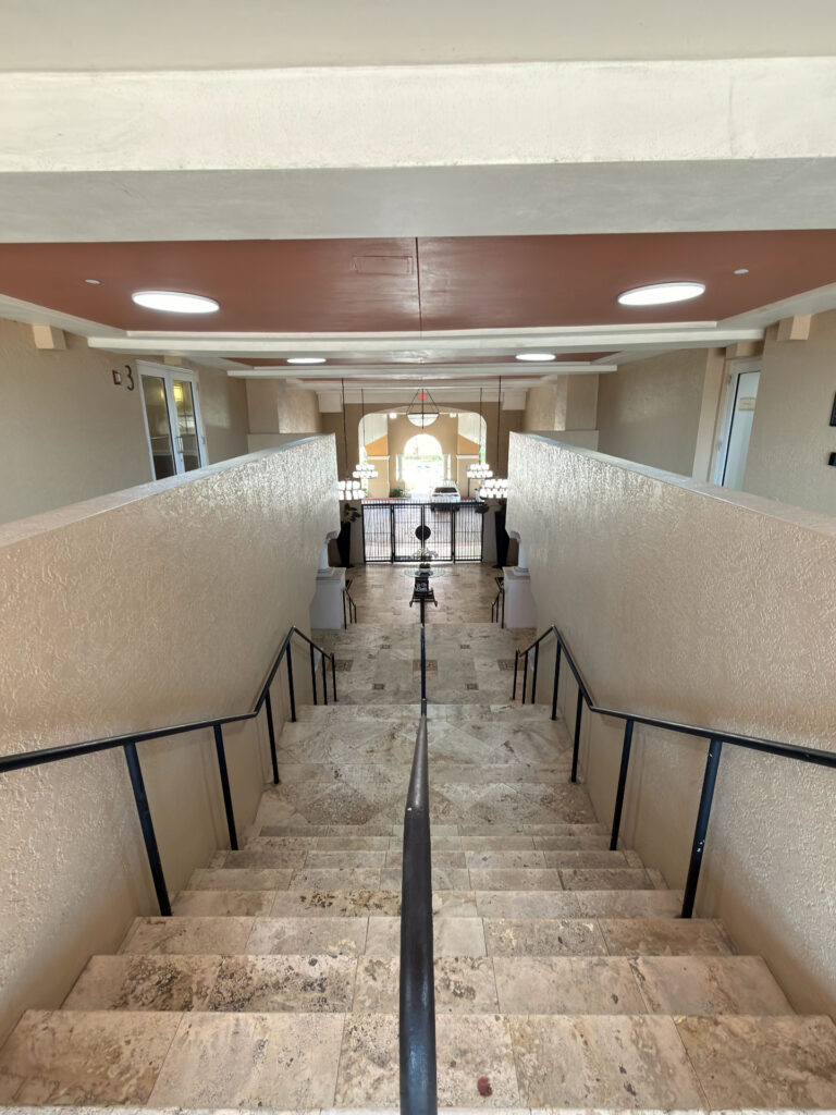 Clean common-area stairway at a managed property in Broward County